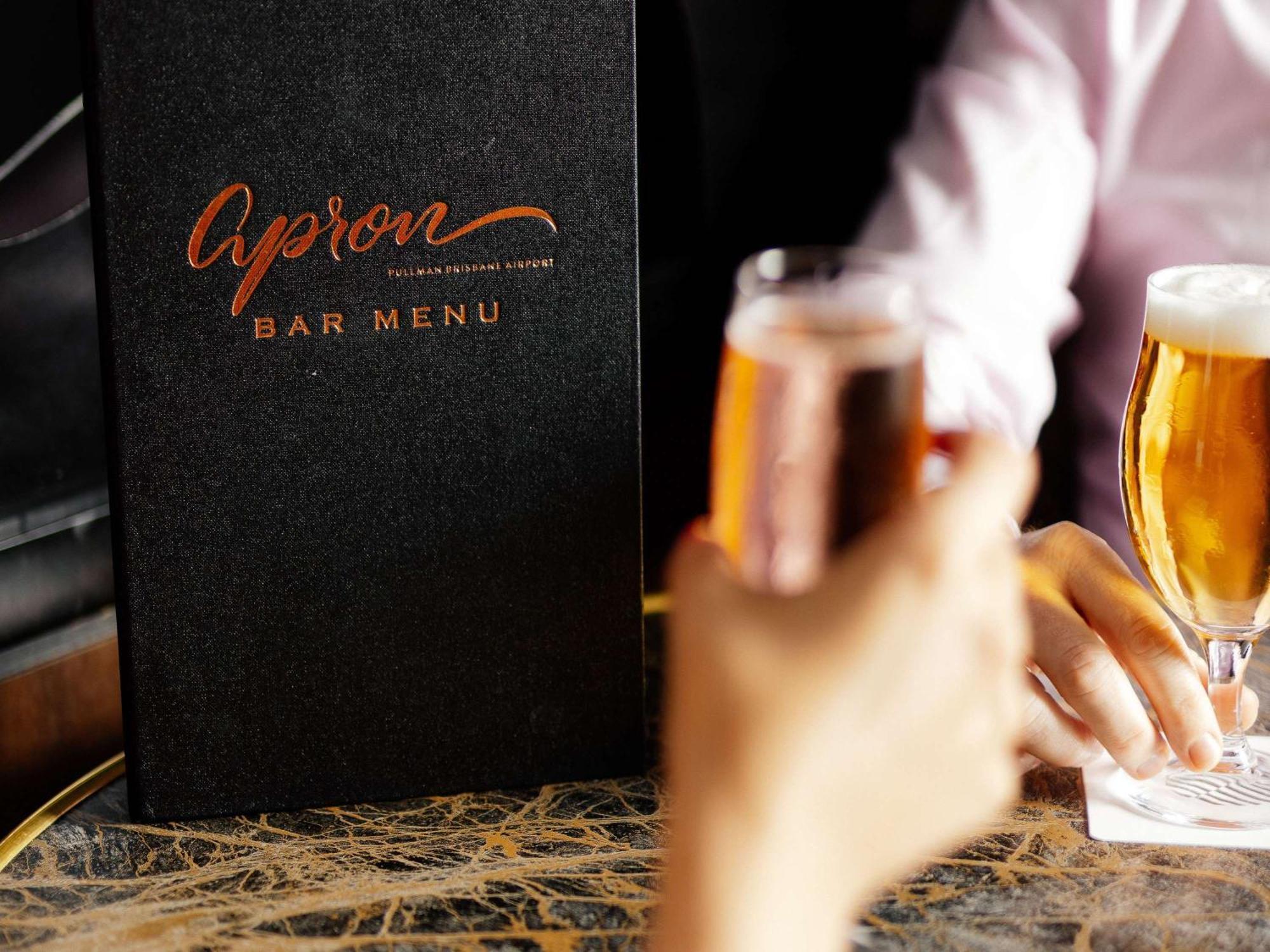 Hotel Pullman Brisbane Airport Exterior foto A bar menu