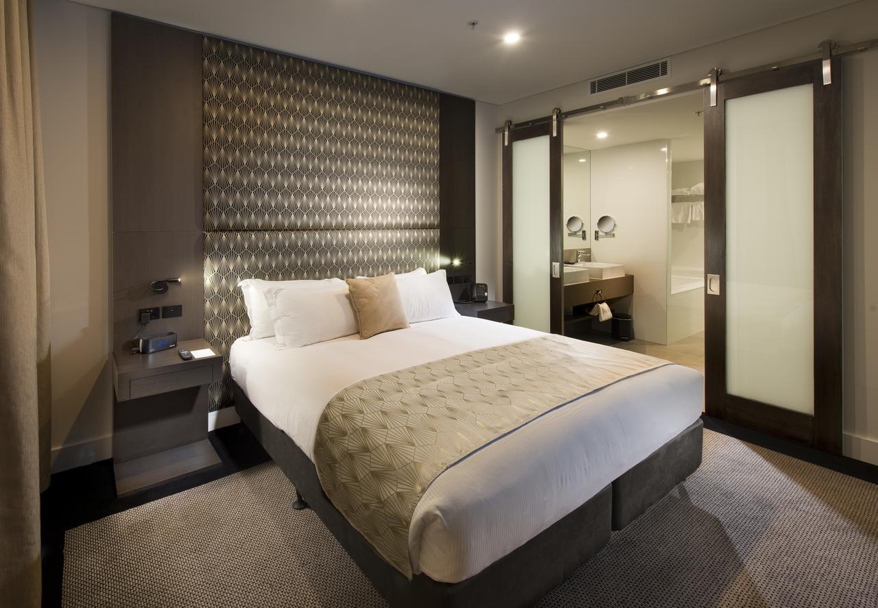 Hotel Pullman Brisbane Airport Exterior foto A bedroom at the hotel