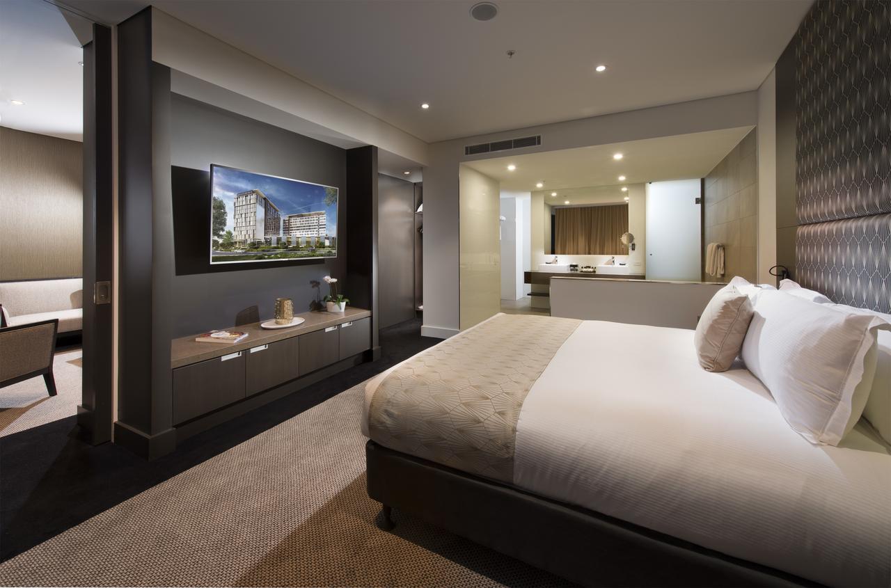Hotel Pullman Brisbane Airport Exterior foto A bedroom at the hotel