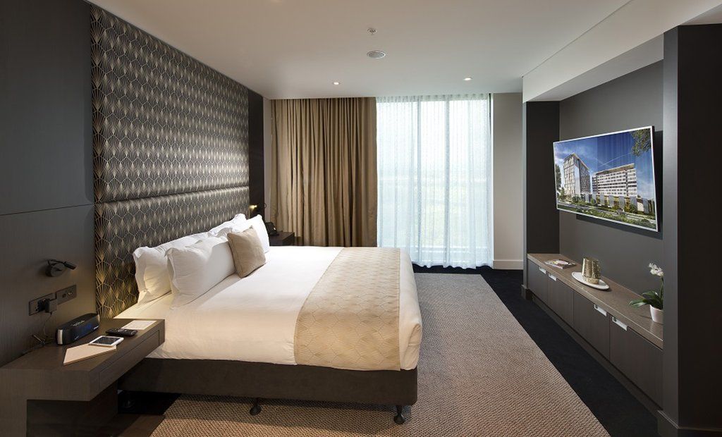 Hotel Pullman Brisbane Airport Exterior foto A bedroom at the hotel