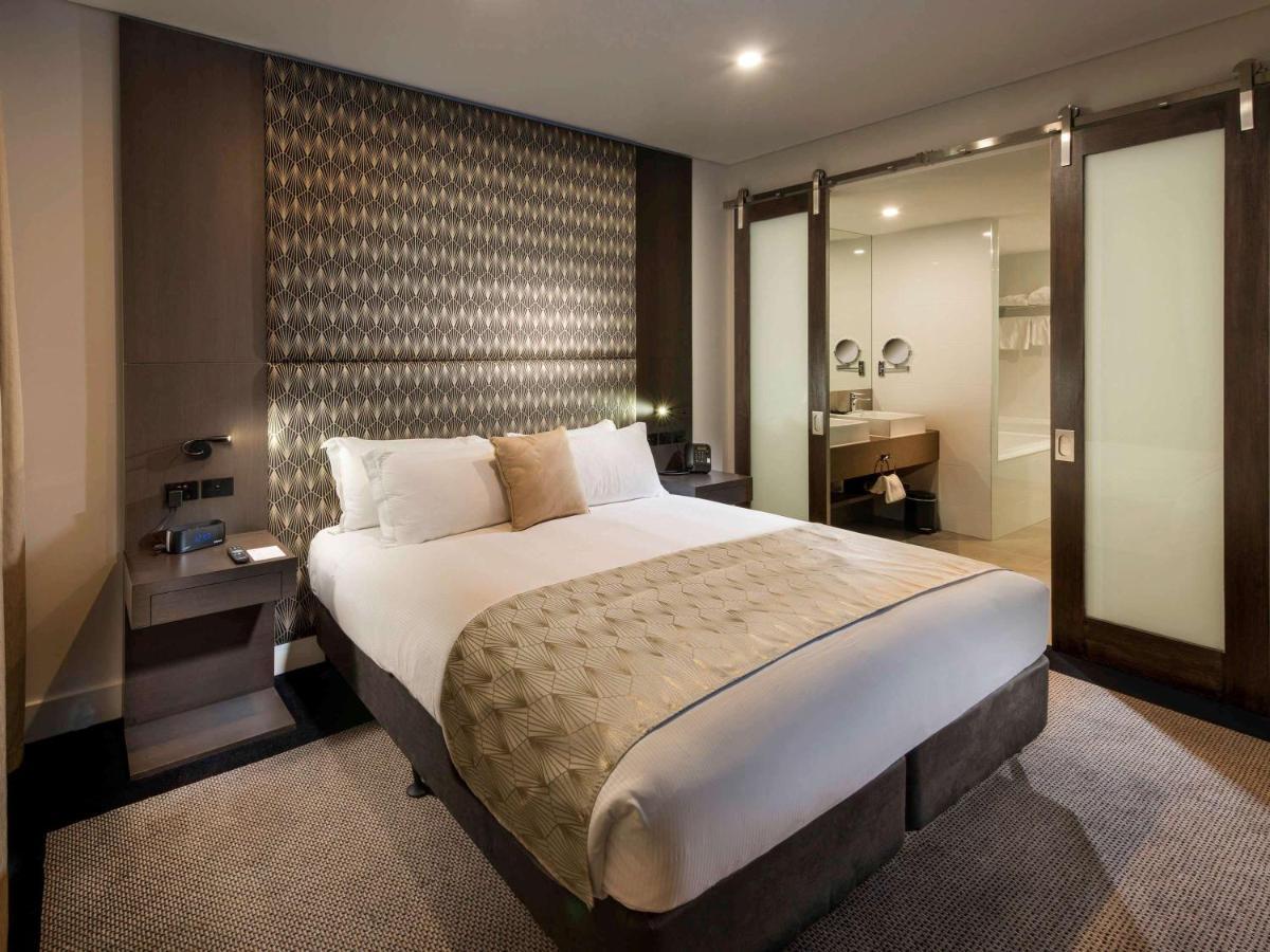 Hotel Pullman Brisbane Airport Exterior foto A bedroom at the hotel